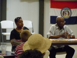 Charles Alexander speaks about family lineage (Virginia Lawrence looks on).